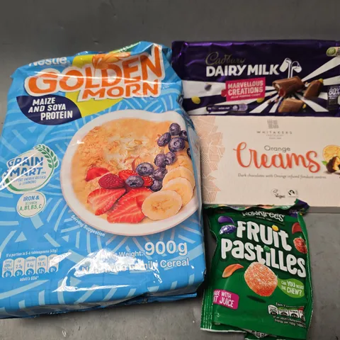 APPROXIMATELY 15 ASSORTED FOOD ITEMS TO INCLUDE - FRUIT PASTILLES , DAIRY MILK MARVELLOUS CREATIONS , GOLDEN MORN ETC