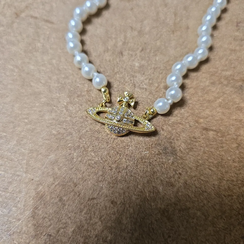 BOXED VIVIENNE WESTWOOD PEARL NECKLACE WITH ORBITAL PENDANT
