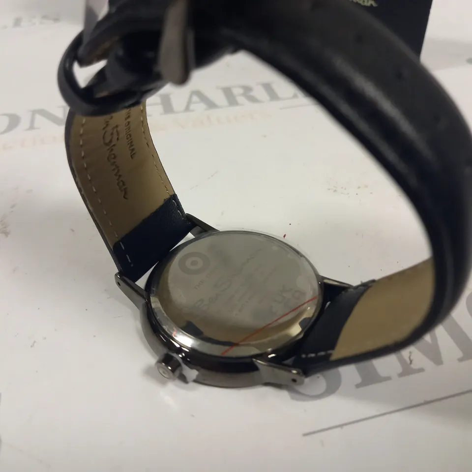 BOXED BEN SHERMAN STAINLESS STEEL BACK WATCH WITH BLACK LEATHER STRAP