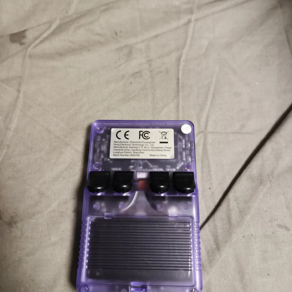 GAME CONSOLE R36S HANDHELD – PURPLE TRANSLUCENT