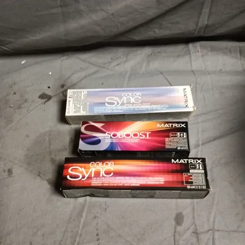 BOX OF APPROXIMATELY 60 MATRIX HAIR CARE PRODUCTS INCLUDING COLOR SYNC VIOLET, BRUNETTE MATTE/MOCHA/NEUTRAL/ASH AND SOBOOST YELLOW