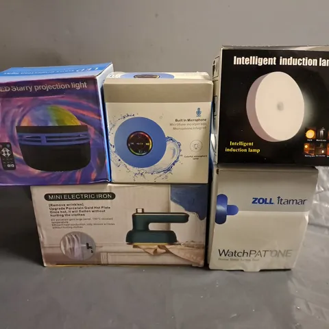 APPROXIMATELY 10 ASSORTED ITEMS TO INCLUDE - INTELLIGEN INDUCTION LAMP , WATERPROOF SPEAKER , MINI ELECTRIC IRON ETC