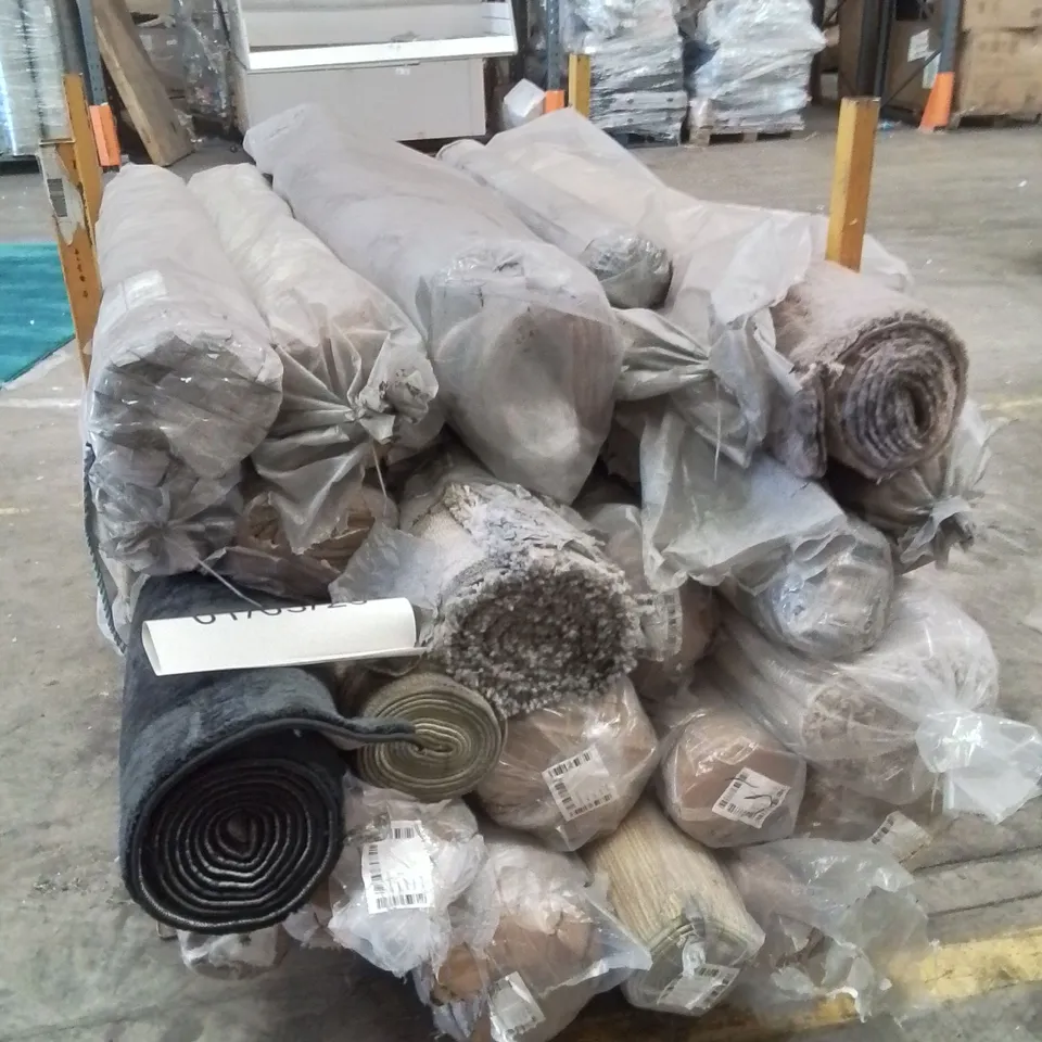 STILLAGE OF APPROXIMATELY 20 BAGGED QUALITY DESIGNER RUGS