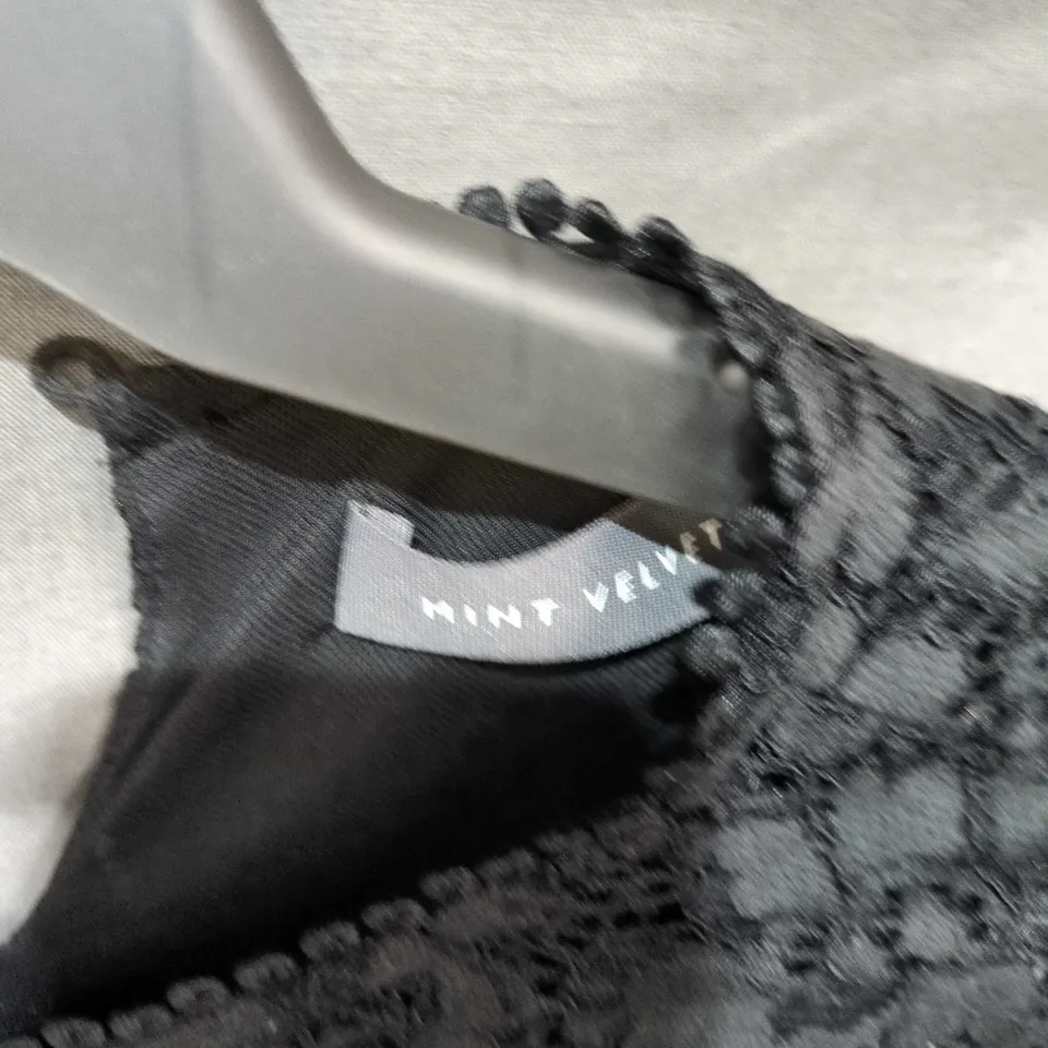 MINT VELVET BLACK LACE TOP - LONG-SLEEVE, FLORAL LACE WITH SCALLOPED EDGES