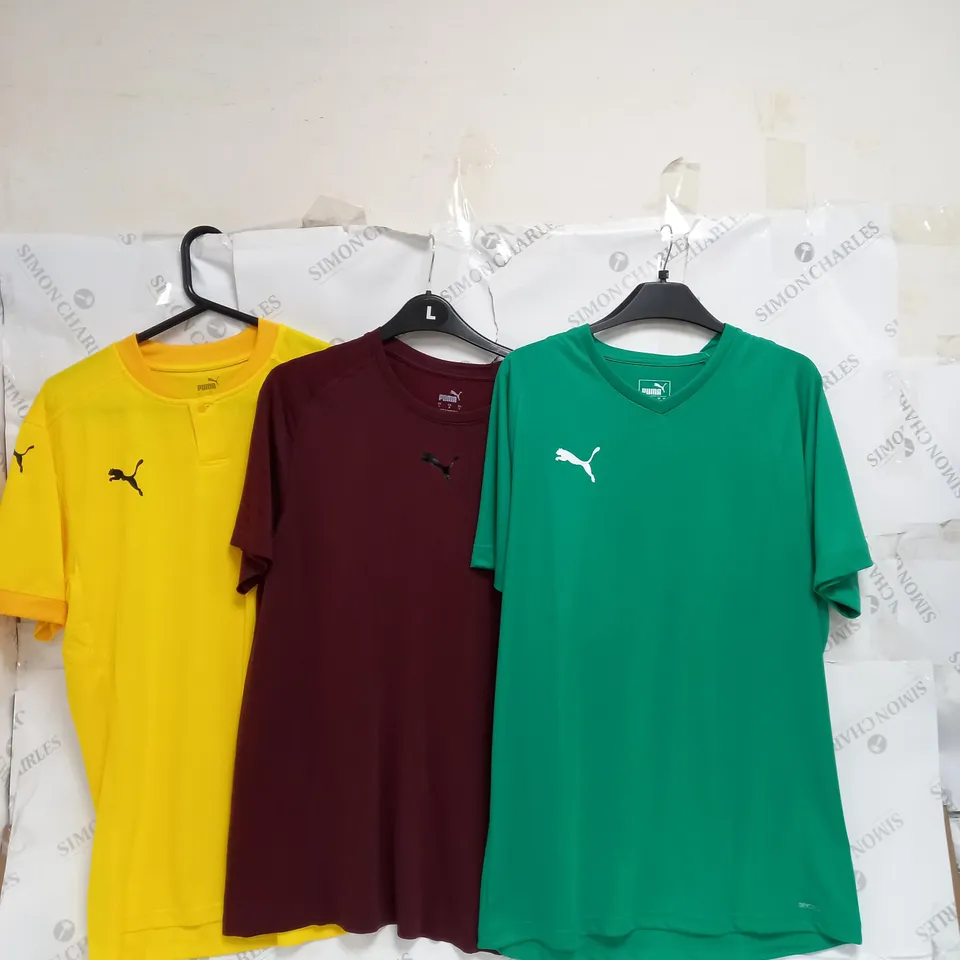 ASSORTED PUMA PIECES OF CLOTHING TO INCLUDE CROP TEES, DRESS TEE, AND SPORT SHORTS ETC.