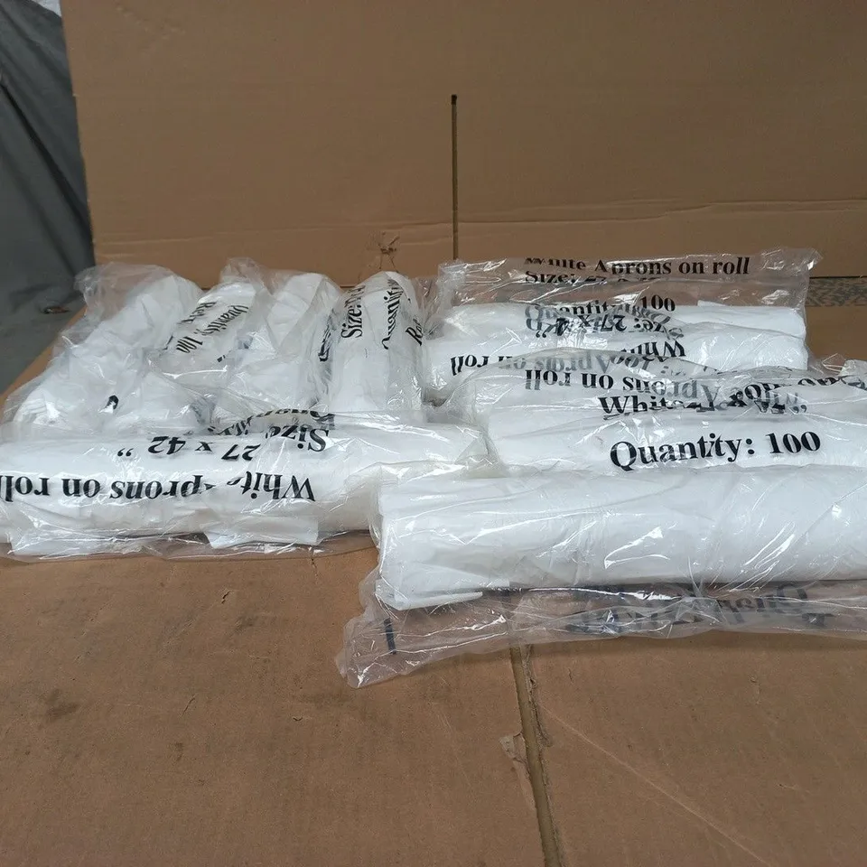 10 X SET OF 100 WHITE APRONS ON ROLL 27 X 42" 