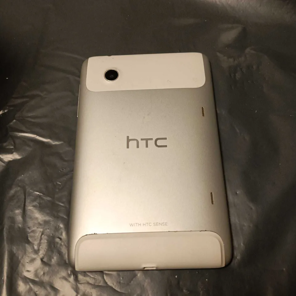 HTC TABLET  – SILVER BACK WITH WHITE CAMERA MODULE 