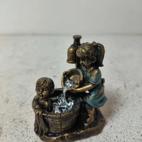 BOY AND GIRL GARDEN STATUE A CHILD GARDEN STATUE
