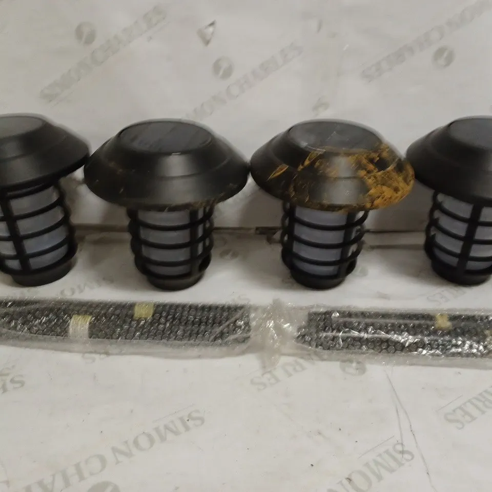 BELL & HOWELL SET OF 4 SOLAR 21 LUMENS DUAL FUNCTION FLAME/ WHITE STAKE LIGHTS