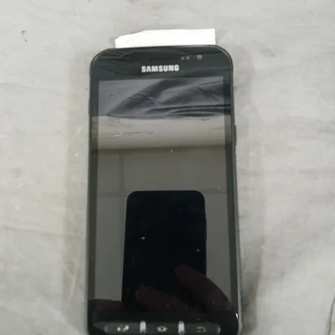 SAMSUNG GALAXY XCOVER 4 UNLOCKED SMARTPHONE - BLACK, 16GB. PHONE DOES NOT POWER ON