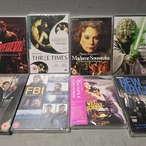 TOTE OF APPROXIMATELY 15 ASSORTED DVD'S TO INCLUDE -STAR WARS , BBC DVD NEW TRICKS , FBI SEASON 5 ETC