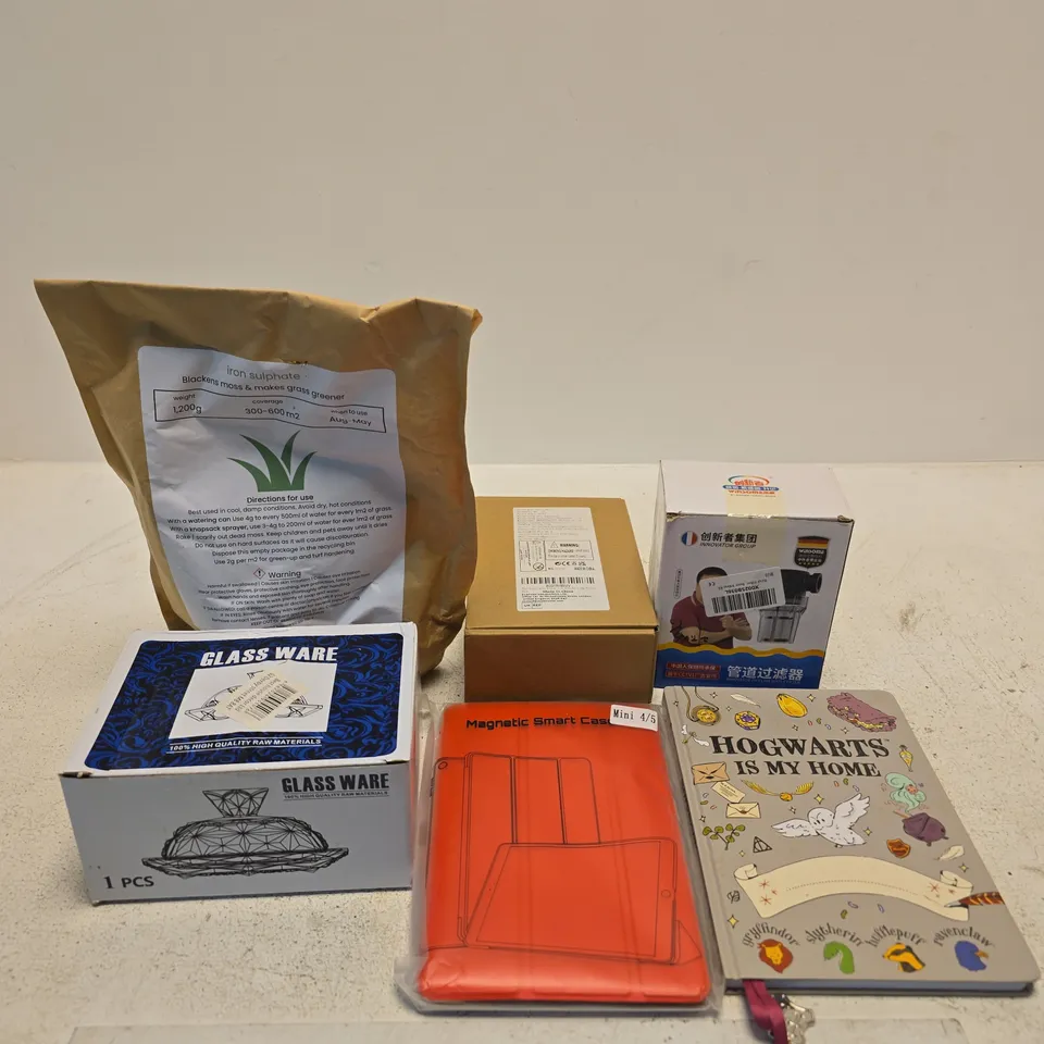 TOTE OF APPROXIMATELY 10 ASSORTED ITEMS INCLUDING HOGWARTS NOTEBOOK, A MAGNETIC SMART CASE FOR A TABLET AND GLASS WARE