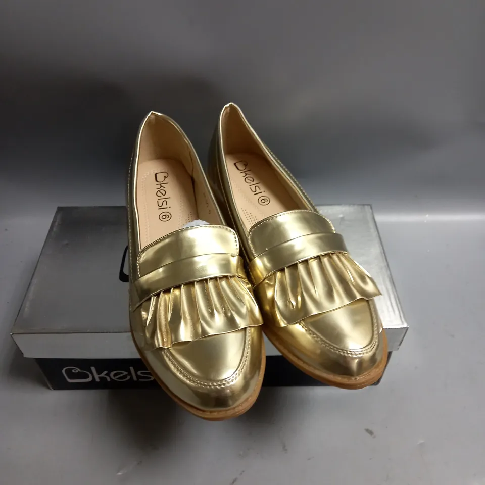 BOXED KELSI LADIES FLAT GOLD BROGUES. SIZE 6
