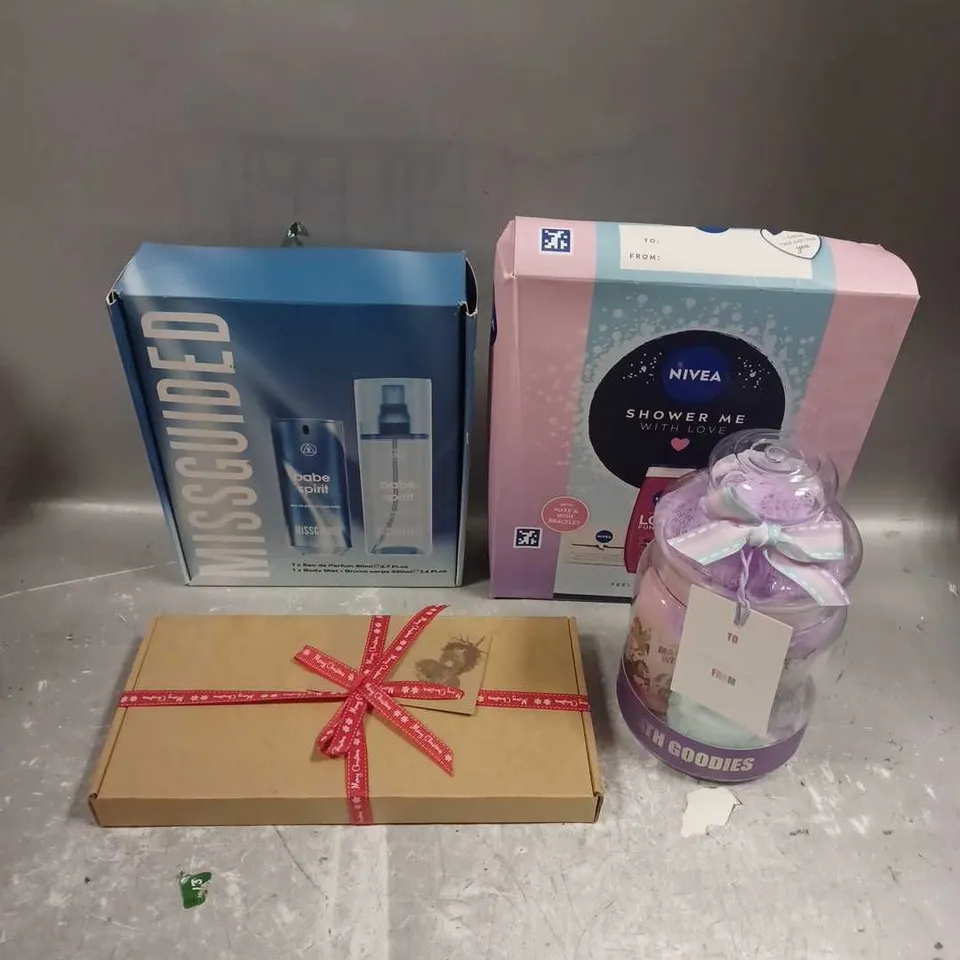 LOT OF 4 ASSORTED COSMETIC BOXSETS TO INCLUDE - NIVEA SHOWER ME BUNDLE - MISGUIDED BABE SPIRIT EAU DE PARFUM DUO - BEAUTY TREATS GIFT - ETC