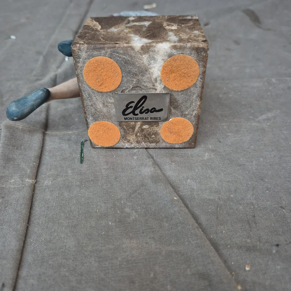 ELISA MONTSERRAT RIBES – HAND-PAINTED SEATED GIRL FIGURINE ON MARBLE BLOCK