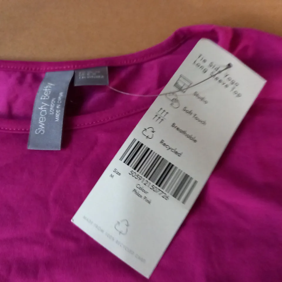 SWEATY BETTY TIE SIDE YOGA LONG SLEEVE TOP IN PINK - M