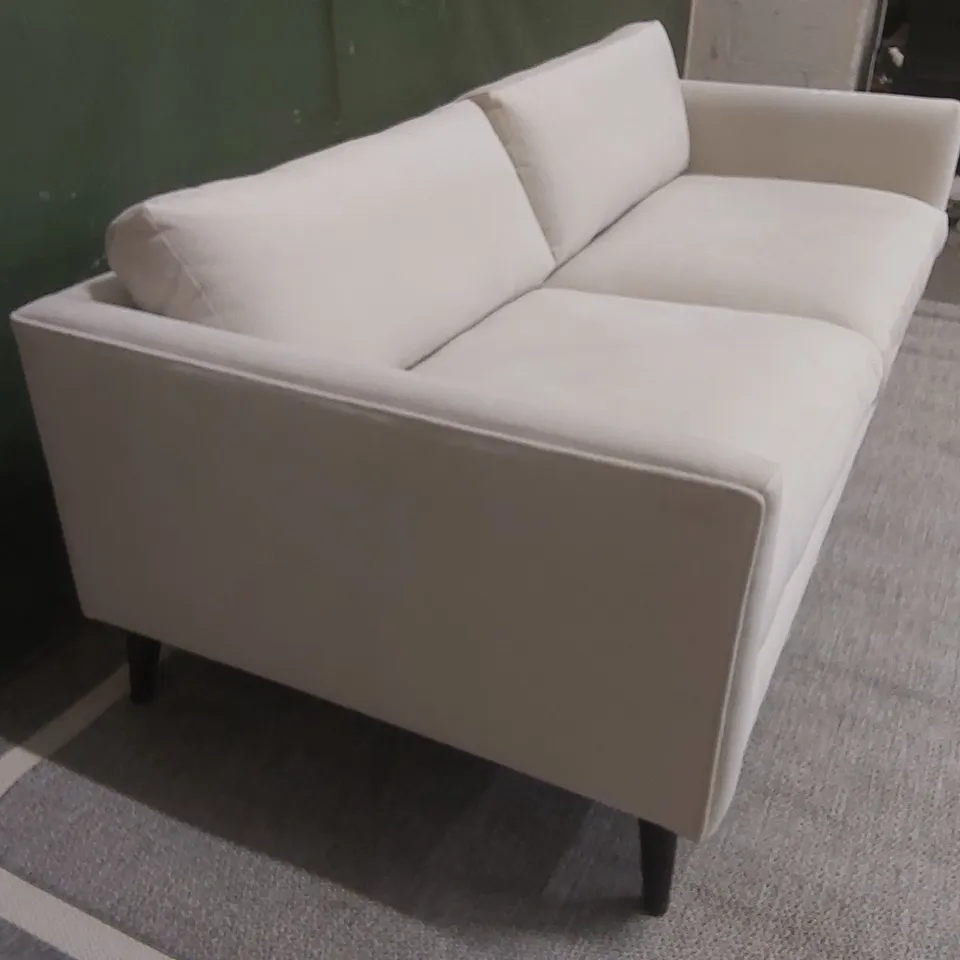 QUALITY EX-SHOWROOM THREE SEATER SOFA UPHOLSTERED IN SOFT OFF-WHITE FABRIC 