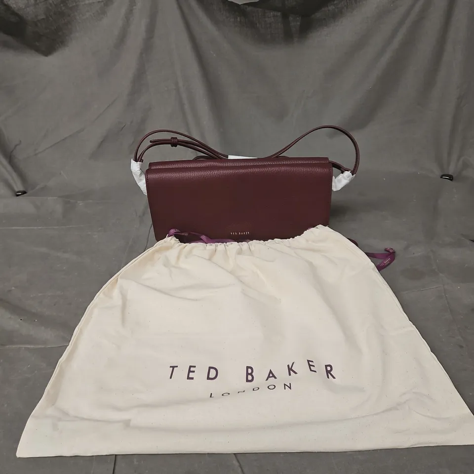 TED BAKER MAROON LEATHER HAND BAG WITH LINEN CARRY BAG