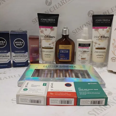 LOT OF APPROX 12 ASSORTED BEAUTY PRODUCTS TO INCLUDE 111 SKIN ROSE GOLD RADIANCE BOOSTER, L'OCCITANE HOMME SHOWER GEL, JOHN FRIEDA PRO FILLER+ THICKENING CONDITIONER, ETC