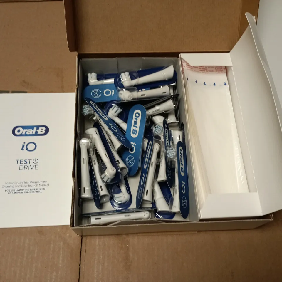 ORAL-B IO TEST DRIVE REFILLS KIT – 25 BRUSH HEADS, 30 PROTECTIVE SLEEVES & INSTRUCTION MANUAL
