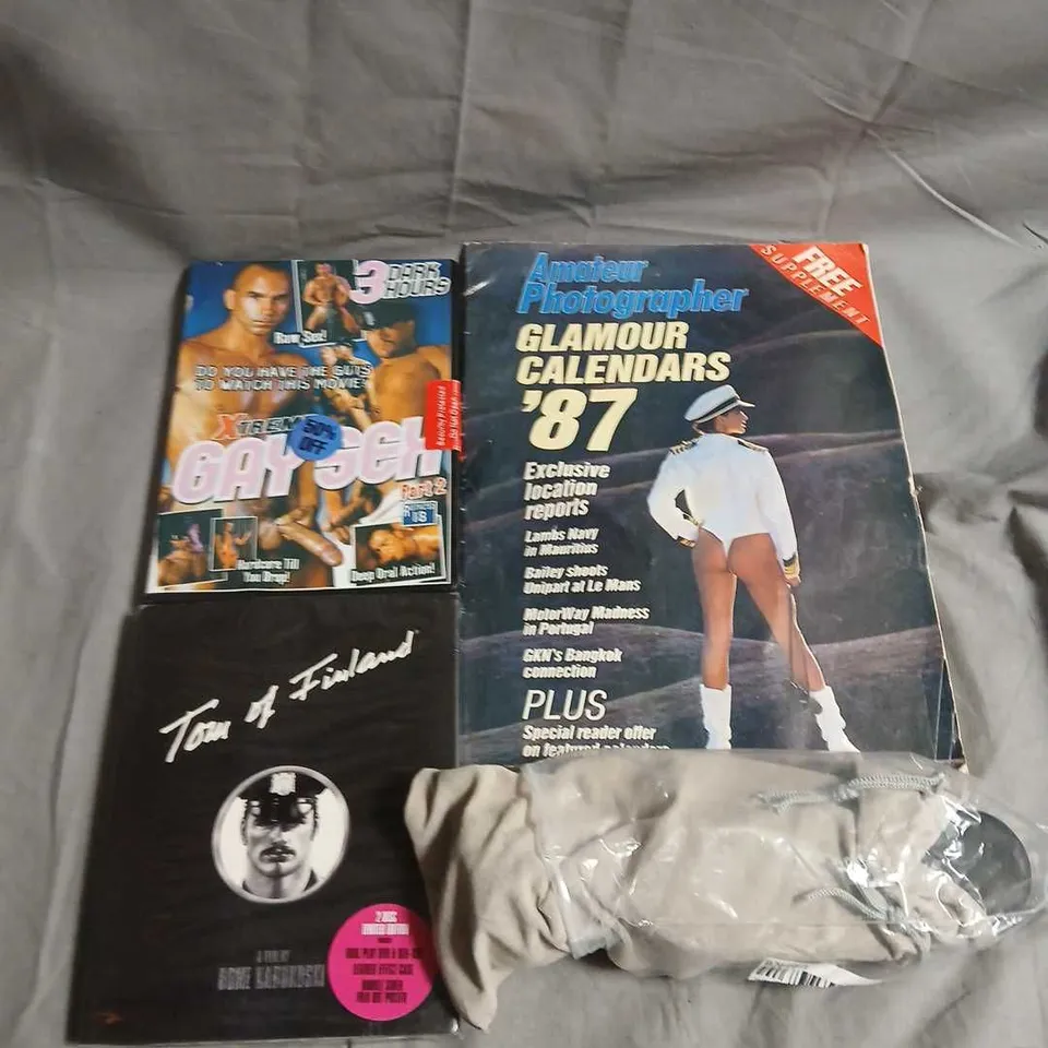box of approx 10 assorted adult accessories to include dvds. magazines and dildo's