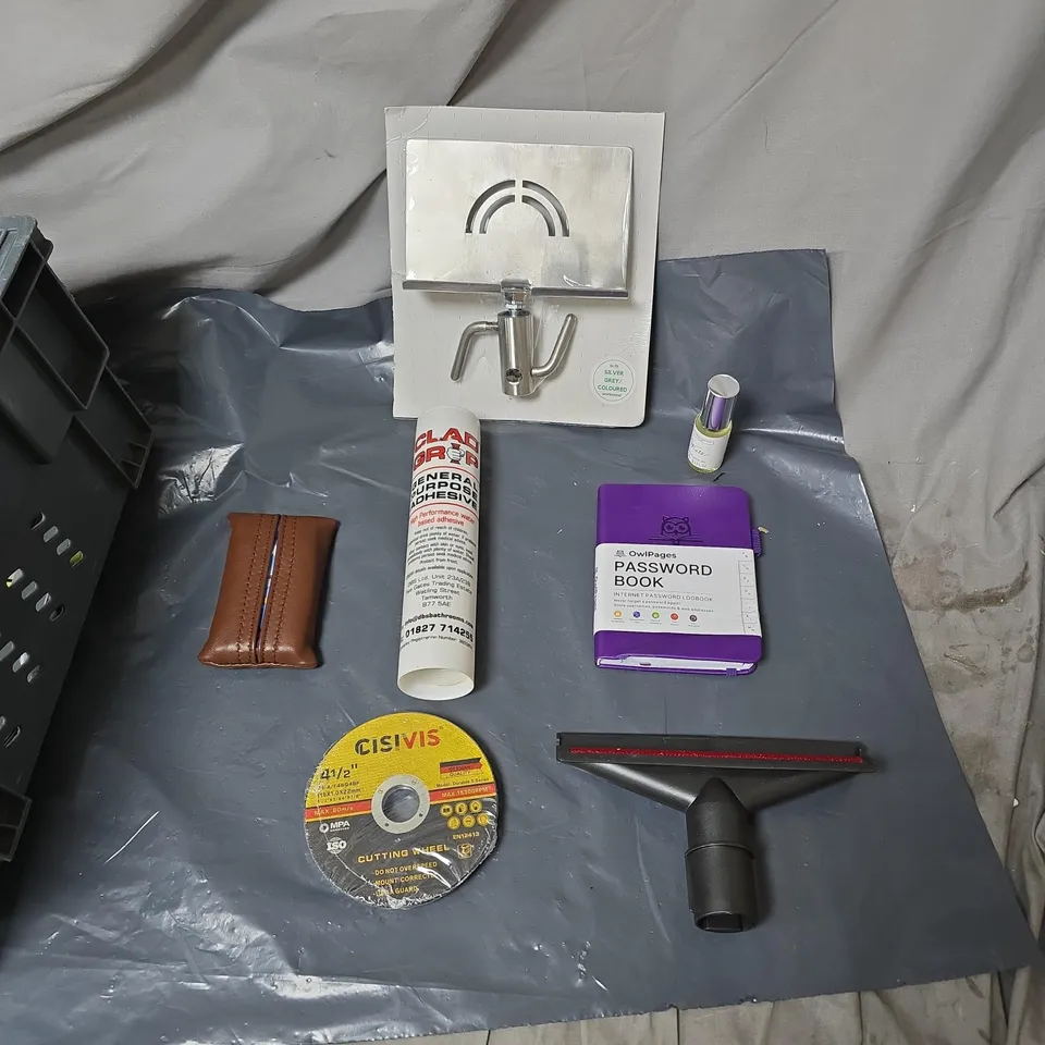 APPROXIMATELY 15 ASSORTED HOUSEHOLD ITEMS TO INCLUDE PASSWORD BOOK, WORKSTAND, FRAGRANCE OIL, ADHESIVE, CUTTING WHEEL ETC 