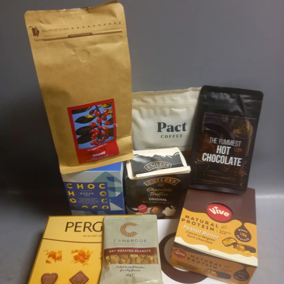 TOTE OF APPROX 12 ASSORTED FOOD ITEMS TO INCLUDE - VIVE PEANUT BUTTER PROTEIN BARS - BAILEY'S CHOCOLATE TRUFFLES - CHOCOCO OCEAN EGG ETC