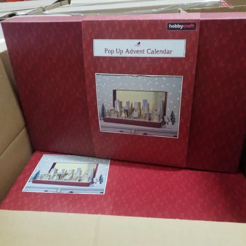 PALLET CONTAINING ASSORTED CHRISTMAS PRODUCTS & DECORATIONS INCLUDING POP UP ADVENT CALENDAR, CHRISTMAS AROMA SET, ELF DOOR KIT & HANGING DECORATIONS