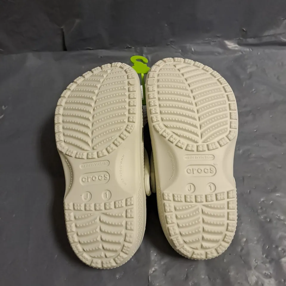PAIR OF CROCS KIDS CLASSIC CLOGS IN LINEN SIZE J1