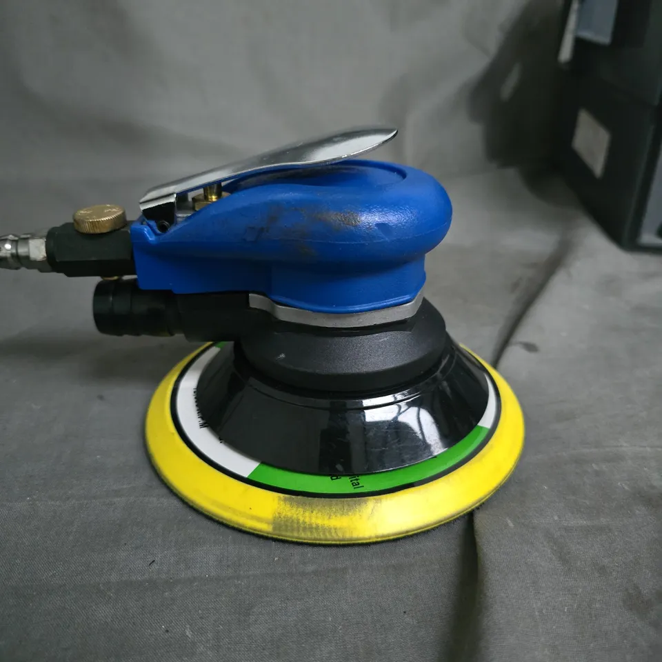 BLUE PNEUMATIC POLISHER/BUFFER WITH YELLOW 7-INCH PAD
