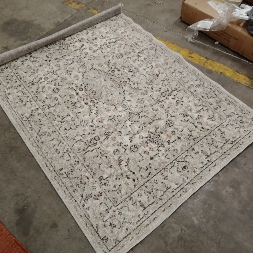 STILLAGE OF APPROXIMATELY 20 DESIGNER RUGS