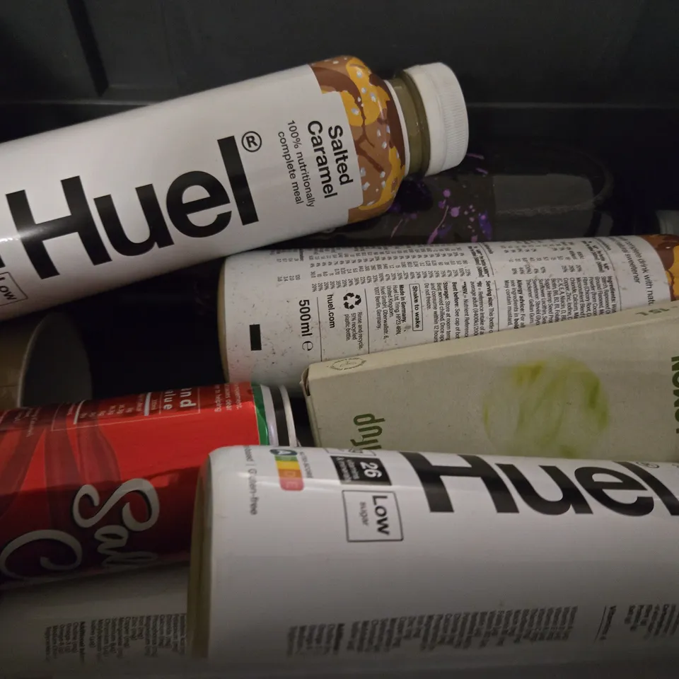 TOTE OF APPROXIMATELY 7 ASSORTED FOOD ITEMS TO INCLUDE - COCONUT MILK , DR PEPPER , HUEL SALTED CARAMEL ETC