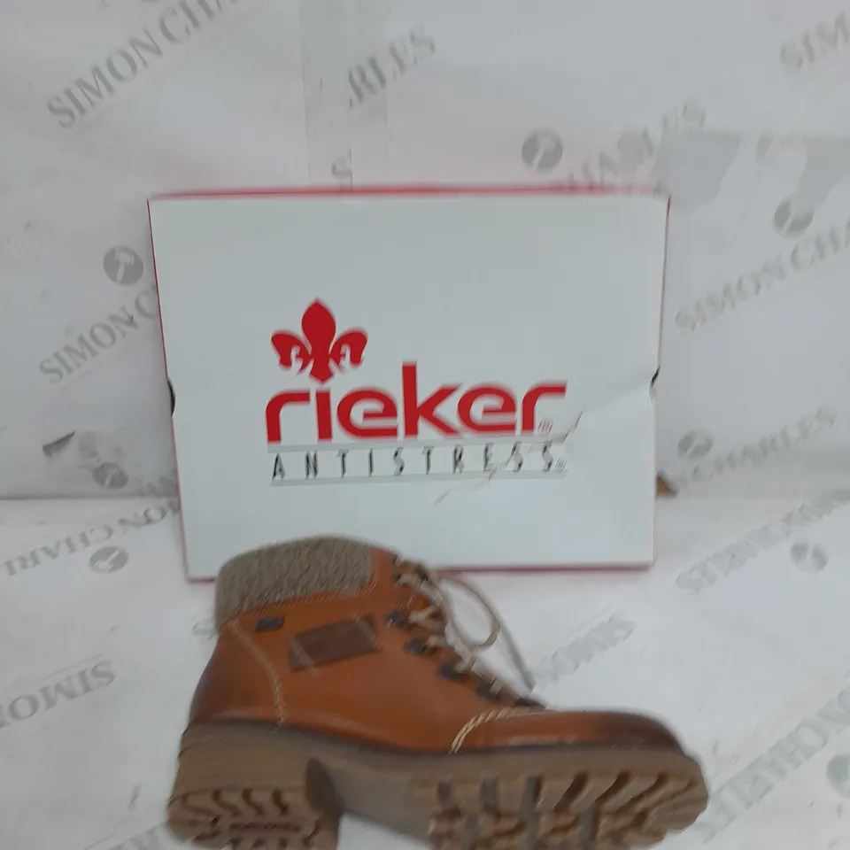 BOXED PAIR OF RIEKER WATER RESISTANT HIKING BOOTS IN BROWN ZIP UP SIZE 4
