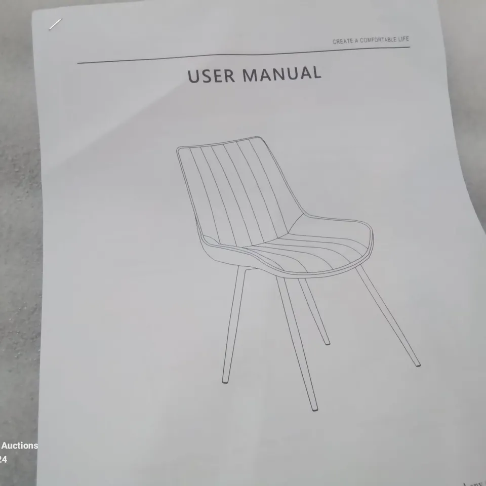 A BOXED PAIR OF BROWN FAUX LEATHER UPHOLSTERED DINING CHAIRS
