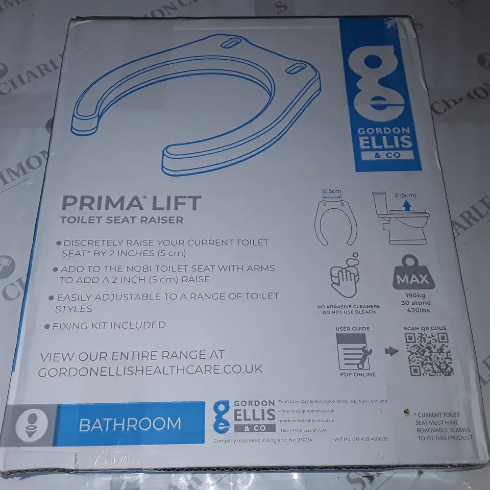 BOXED PRIMA LIFT TOILET SEAT RAISER