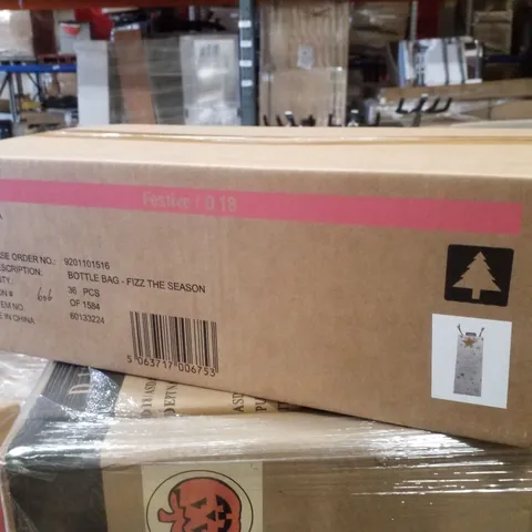PALLET CONTAINING LARGE QUANTITY OF BRAND NEW BOTTLE GIFT BAGS & 2 8M CHRISTMAS TREES