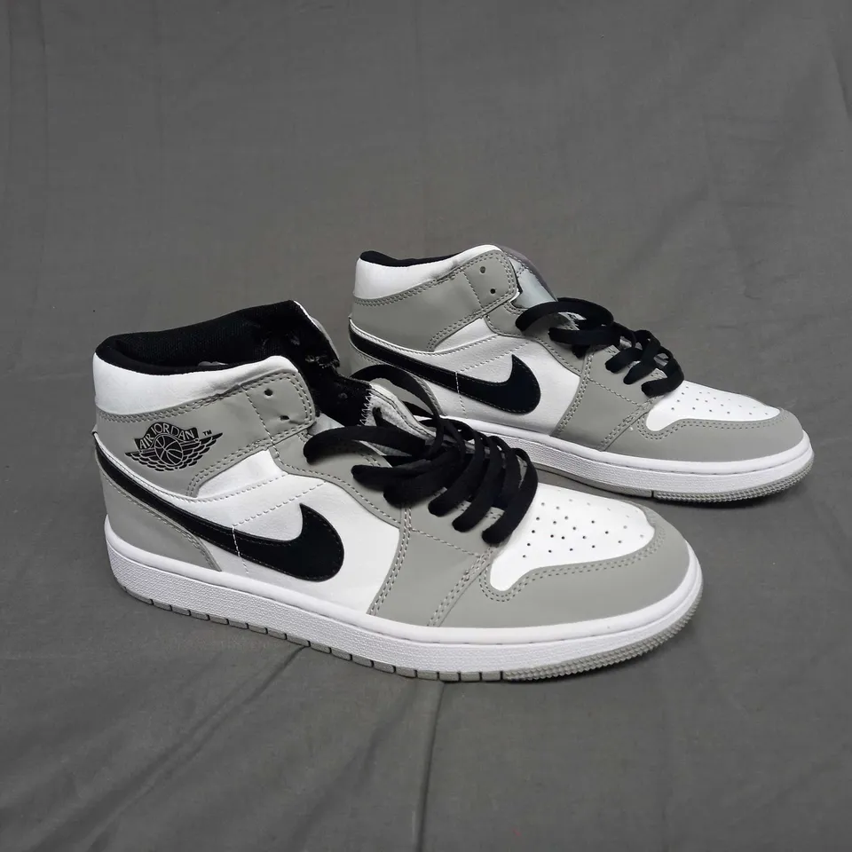 UNBOXED PAIR OF AIR JORDAN 1 MIDS IN GREY/BLACK SIZE UK 7.5
