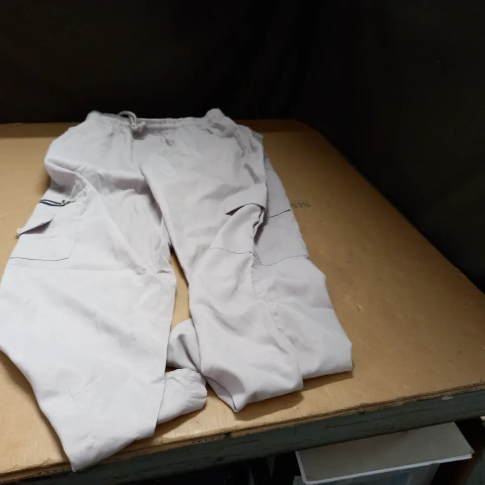 PAIR OF BEIGE TRACKSUIT PANTS MEDIUM