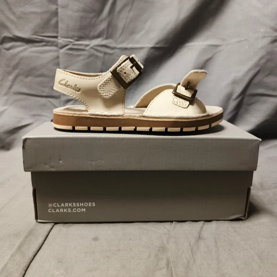 BOXED PAIR OF CLARKS KIDS OPEN TOE SANDALS IN OFF-WHITE SIZE UK 7.5