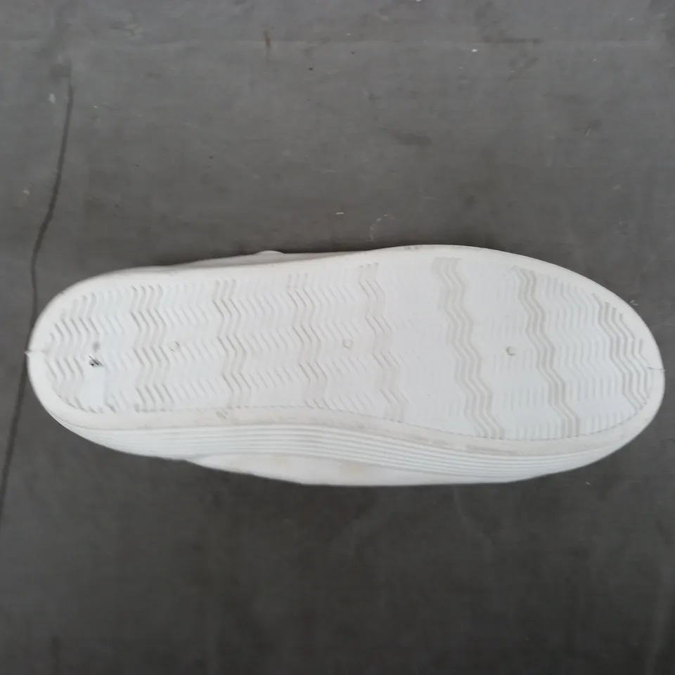 A BOX OF APPROXIMATELY 20 PAIRS OF WHITE SHOES. VARIOUS SIZES