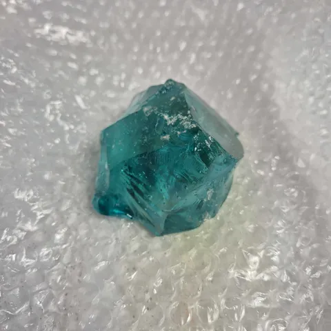 AQUA COLOURED OBSIDIAN PIECE