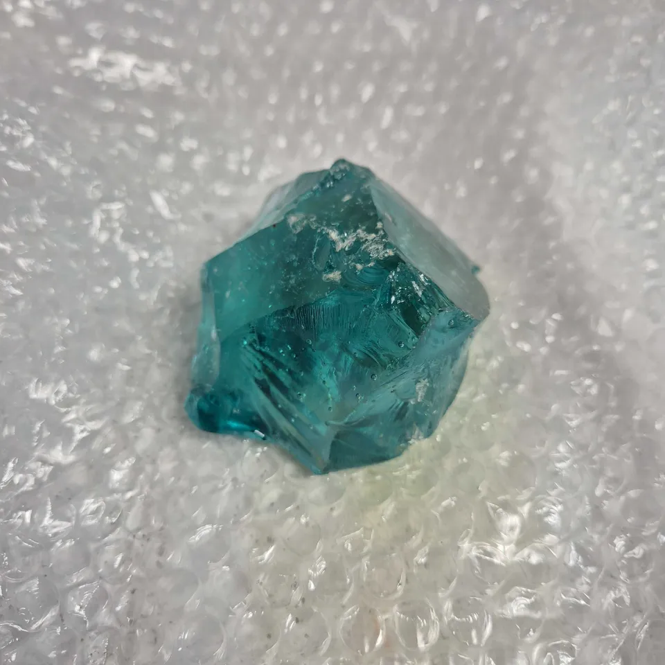 AQUA COLOURED OBSIDIAN PIECE