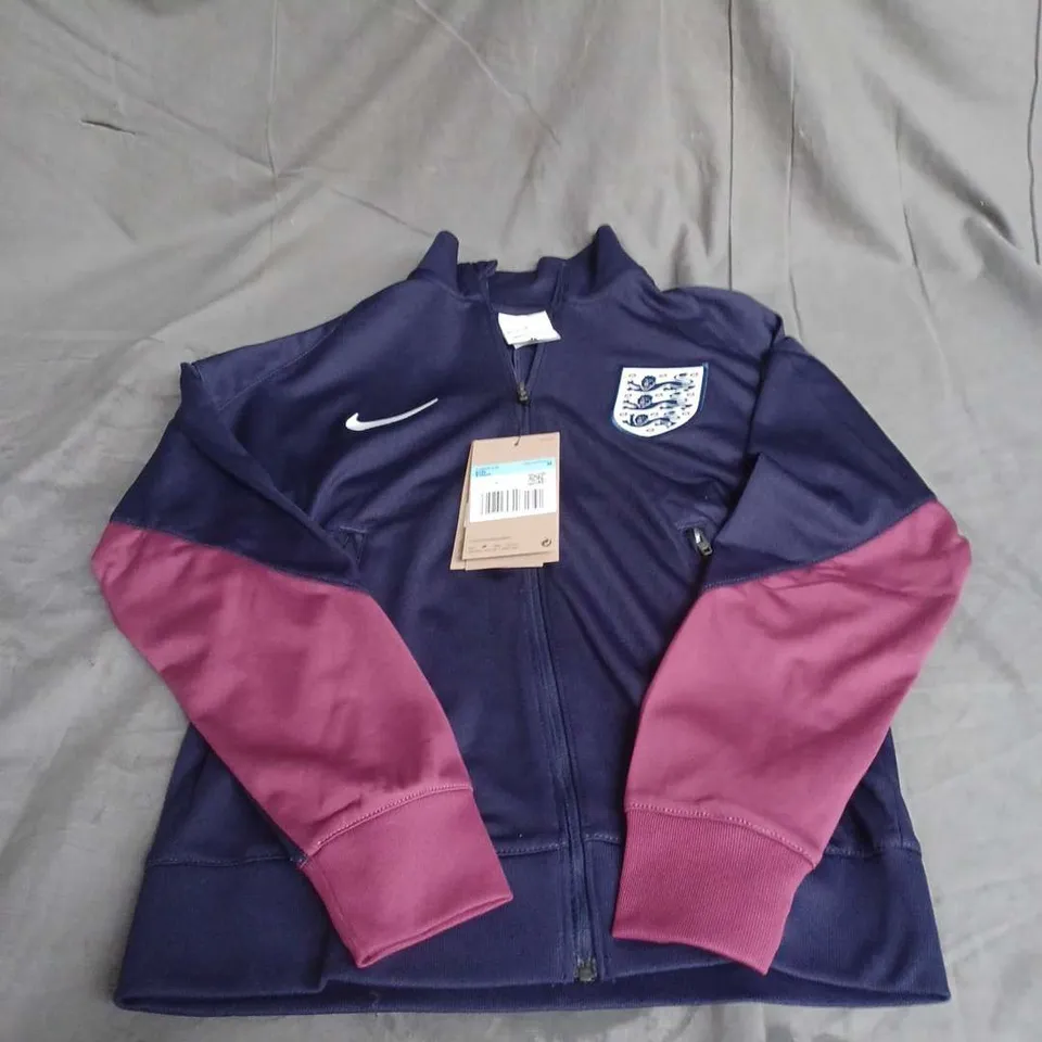 NIKE KIDS ENGLAND ZIP UP TRACK TOP IN PURPLE MULTI SIZE M