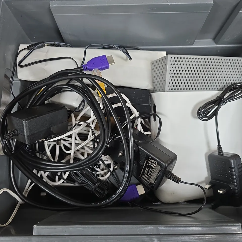 APPROXIMATELY 15 ASSORTED HOUSEHOLD PRODUCTS TO INCLUDE WIFI ROUTER, POWER CABLES, TV REMOTES ETC 