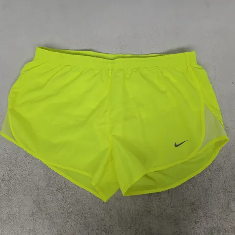 NIKE RUNNING TEMPO SHORTS IN A BRIGHT YELLOW SIZE MEIDUM