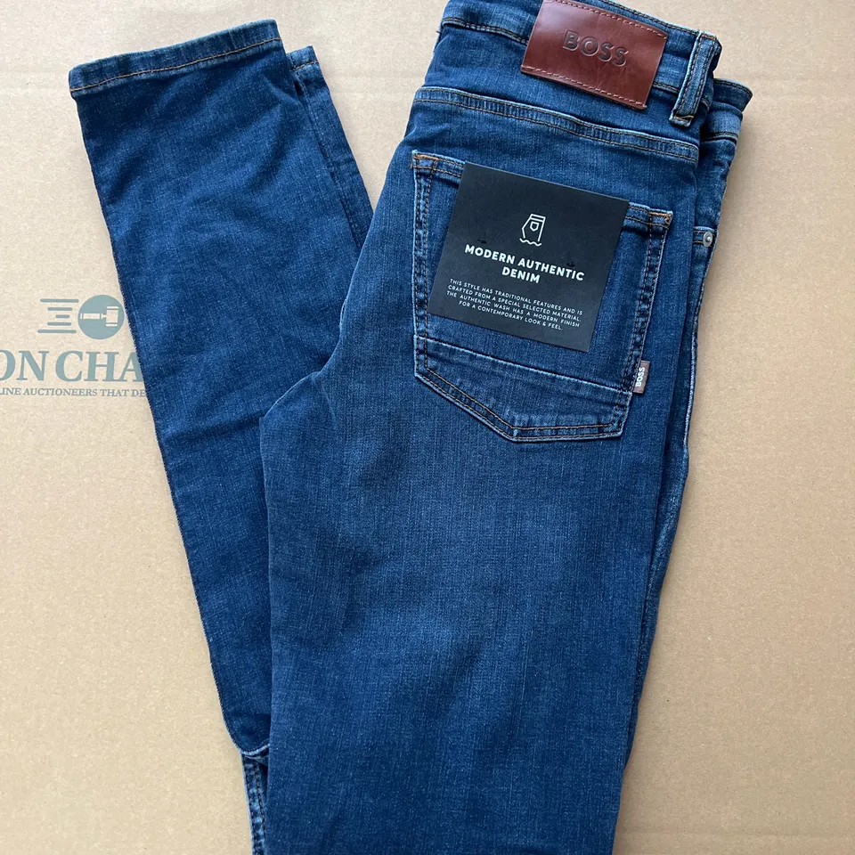 HUGO BOSS DELANO SLIM TAPERED JEANS IN SIZE W29 L34