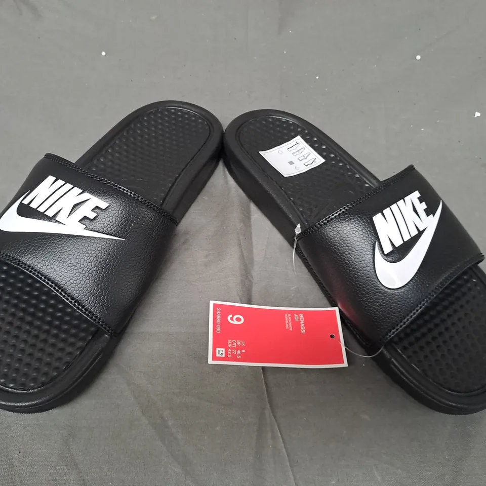 PAIR OF NIKE SLIDERS IN BLACK/WHITE UK SIZE 8