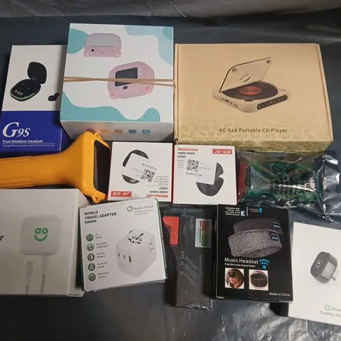 LOT OF 12 ASSORTED TECH ITEMS TO INCLUDE PORTABLE CD PLAYER, AO POWER ADAPTER AND TWS EARBUDS