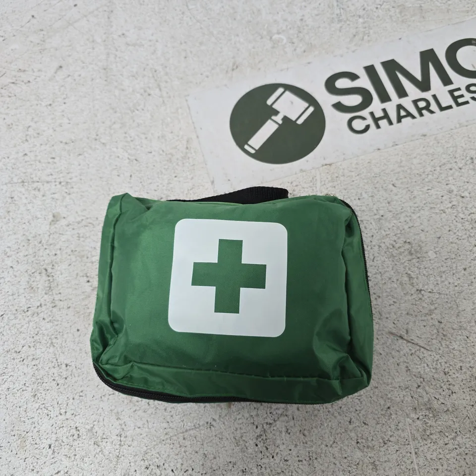 GREEN FIRST AID KIT POUCH WITH ASSORTED DRESSINGS AND MEDICAL SUPPLIES