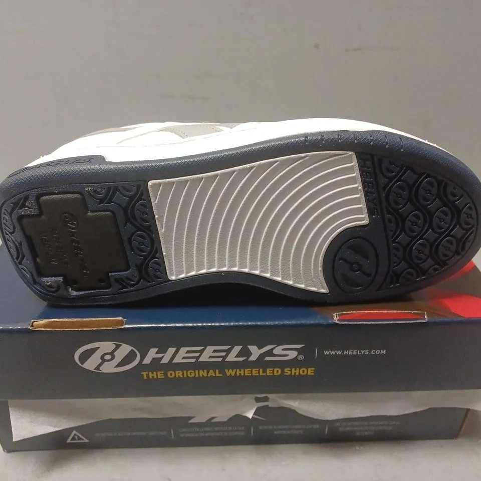 BOXED PAIR OF REEBOK HEELYS - UK SIZE 2